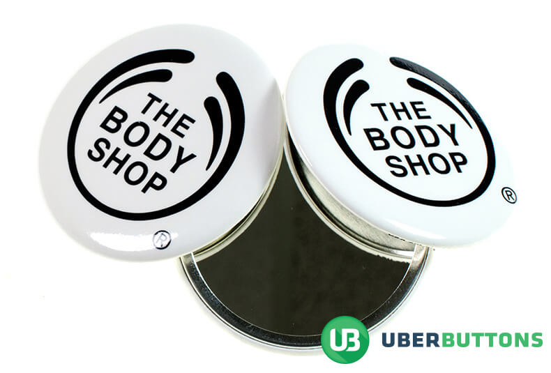 body shop mirror button on white background